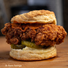 Load image into Gallery viewer, A Delicious close-up shot of a Chicken Biscuit. From the top-down: biscuit, Hot Jawn Chili Sauce, pickles, butter, biscuit. Photo by Penn Tasinga