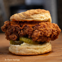 Load image into Gallery viewer, A Delicious close-up shot of a Chicken Biscuit. From the top-down: biscuit, Hot Jawn Chili Sauce, pickles, butter, biscuit. Photo by Penn Tasinga
